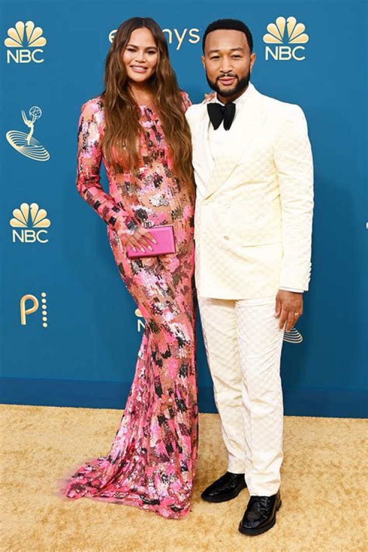 Chrissy Teigein Shows Off Her Baby Bump At The Emmys In Metallic Gown