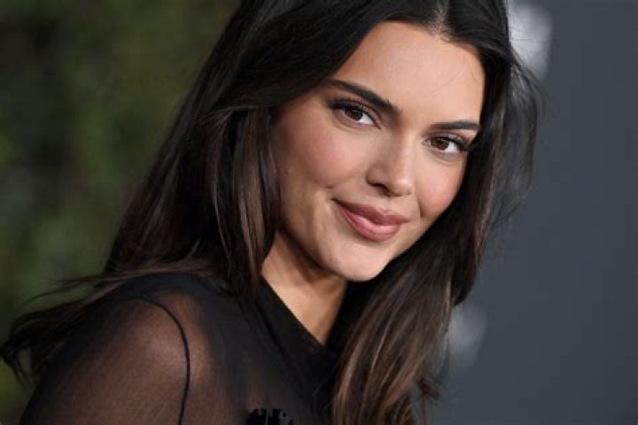 Kendall Jenner Wears Her New Makeup Collab With Kylie Jenner & ‘Not Much Else’ In Sexy New Pics