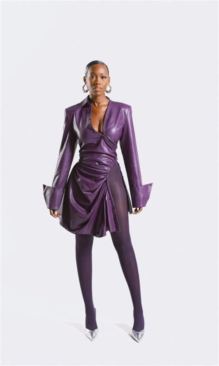 Kim Kardashian Rocks Purple Leather Dress & Matching Coat In Stunning New Photos